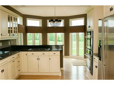 Kitchen. Bright kitchen has granite counter tops &