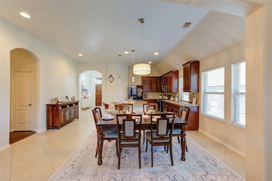 The dining room provides a warm and welcoming sett