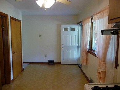Kitchen. Breakfast area shows picture window and d