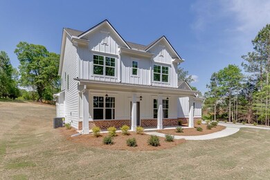 View of front of property featuring central AC, a 