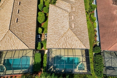 View of subject property with a pool area