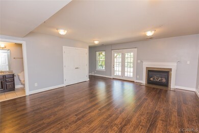 Basement rec room/den. Full bathroom to the left.