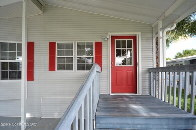 293 Plantation Dr, Titusville, FL 32780 - photo 4