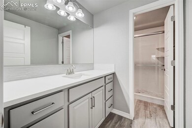 Dining area featuring beverage cooler, baseboards,