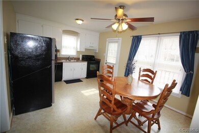 Kitchen with access to the deck and back yard serv