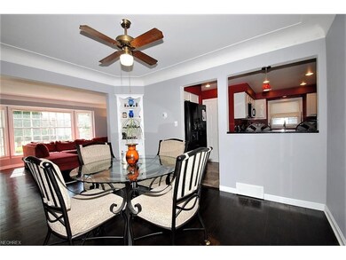 FORMAL DINING ROOM INCLUDES BUILT IN SHELVING, WOO