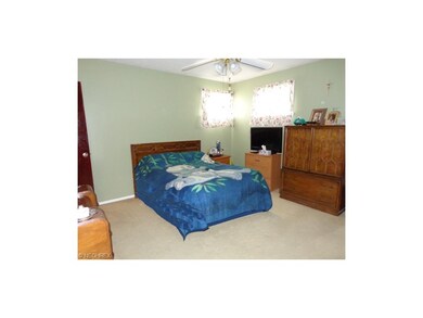 The spacious Master bedroom has its own private en