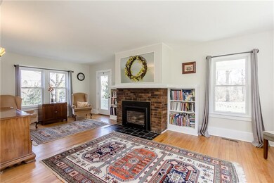 Living room with brick fireplace