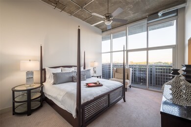 The generously sized bedroom serves as a tranquil