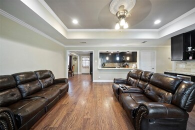 The kitchen is open to living area and there is bar seating