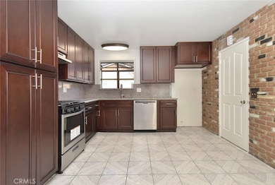 Fabulous Kitchen! All new kitchen cabinets, granite counter & back-splash, new stainless steel appliances, new light fixture & garbage disposal.