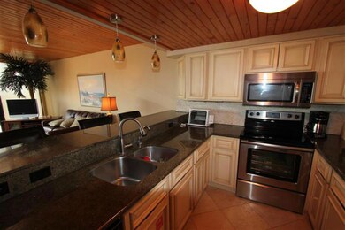 Kitchen with granite counters and stainless steel