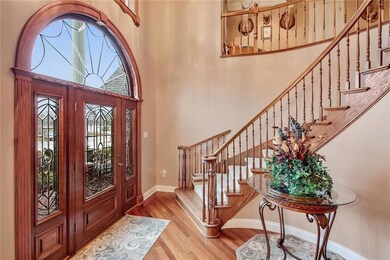 Winding staircase with custom millwork leading to