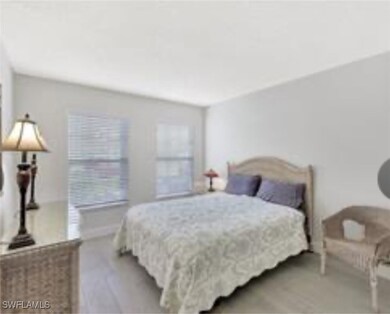 Bedroom featuring baseboards