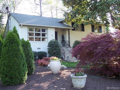 Front w/landscaped lawn