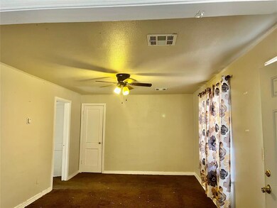 Spare room featuring ceiling fan