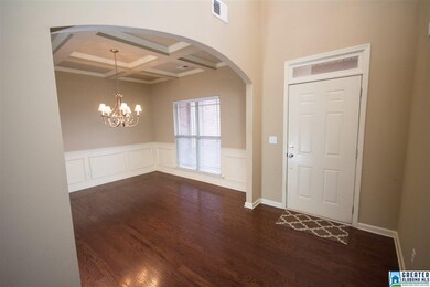 DINING ROOM WITH COFFERED CEILING
