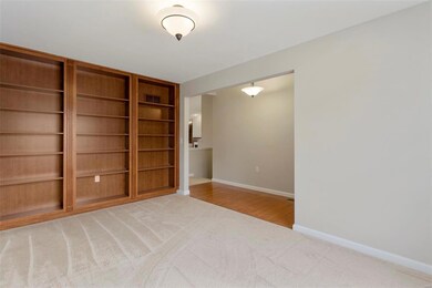 Built-in bookshelves in the den