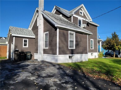 Rear of house off main driveway with door accessin
