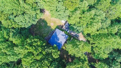 AERIAL VIEW OF THE HOUSE & PROPERTY