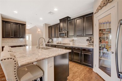 Kitchen with large center island, granite counters