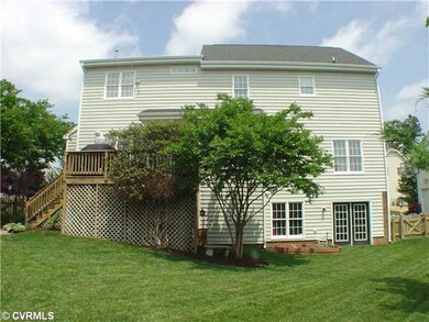 Exterior Back - alk-out daylight basement