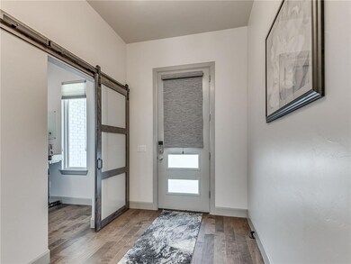 Interior entry and  pocket office w/barn door