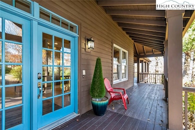Front door on the large covered porch
