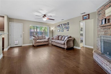 Spacious living room with engineered wood flooring