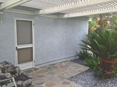 Front courtyard with stone pavers.