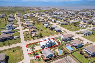 This aerial view highlights a coastal neighborhood