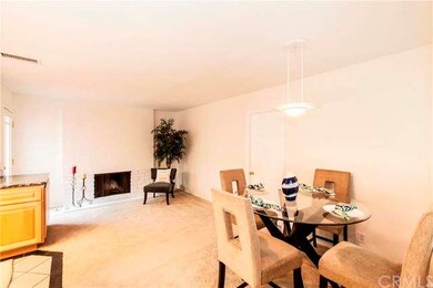 Dining/family room area with gas fireplace