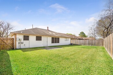 View of the back yard and back of the home