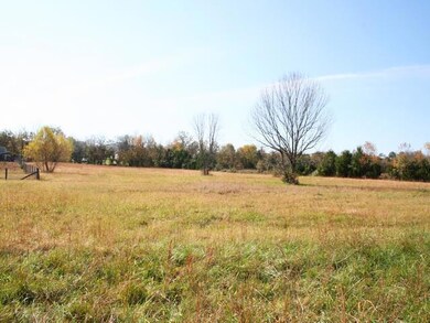 House and 2.81 acres. Perked for 3 bedrooms.