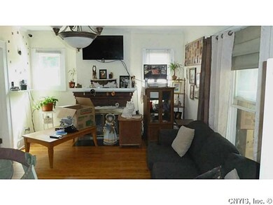 Living Room. Wood burning fireplace, hardwood floo