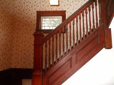 Foyer Note the beautiful  natural woodwork in the 
