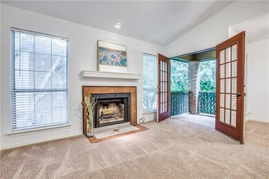 French doors to the private balcony.