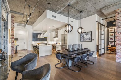 Welcome lively dinner parties under bold pendants