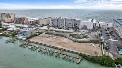Aerial view with a city view and a water view