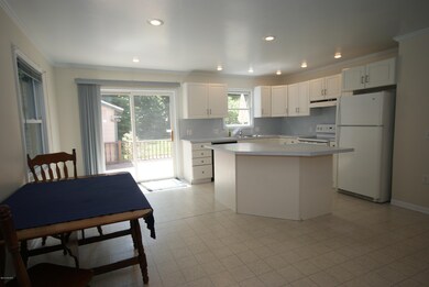 Kitchen with sliding door to deck
