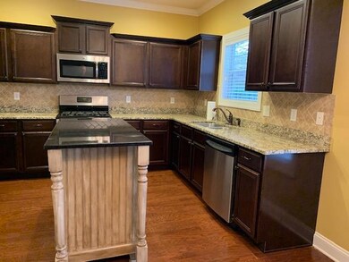 KITCHEN WITH GRANITE - TILE BACK SPLASH - ISLAND STAYS 
