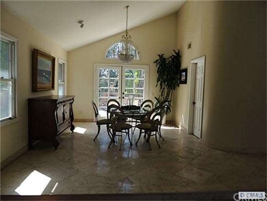 Formal Dining Room with cathedral Ceiling