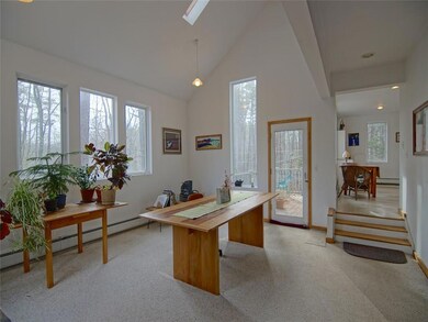 Dining room with vaulted ceiling