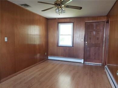 Great Den~ Sitting Area with transitions to Kitche