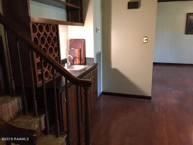 Staircase built-in bar dining in rear 7-