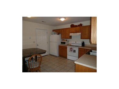 Good sized, eat-in kitchen. Door leads to the gara