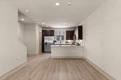 Open concept kitchen and family room make entertai