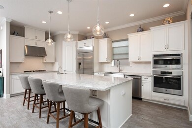 This beautiful kitchen features high ceilings, 42