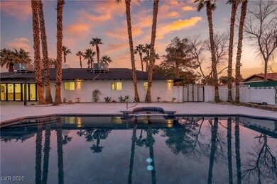 View of pool with a patio, central AC unit, fence,