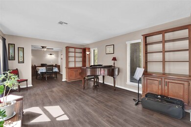 Formal living room leading to dining room
